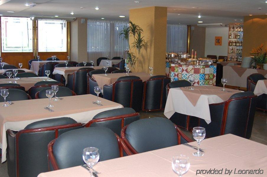 Like Ue Hotel 戈亚尼亚 餐厅 照片